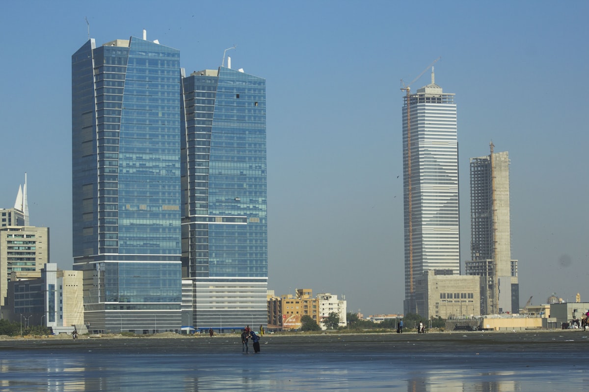 The Karachi skyline, reflecting Laira's Pakistan-rooted, globally informed methodology